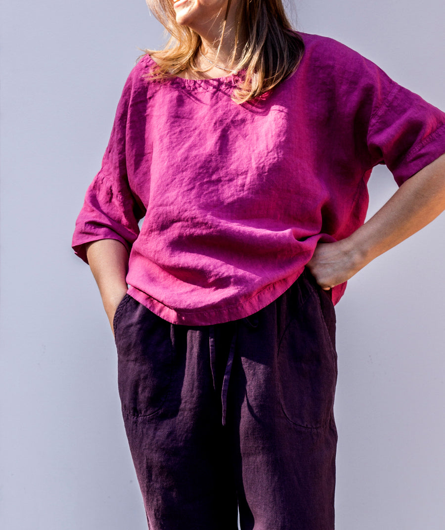 Oversized top with sleeves in Magenta Haze shade