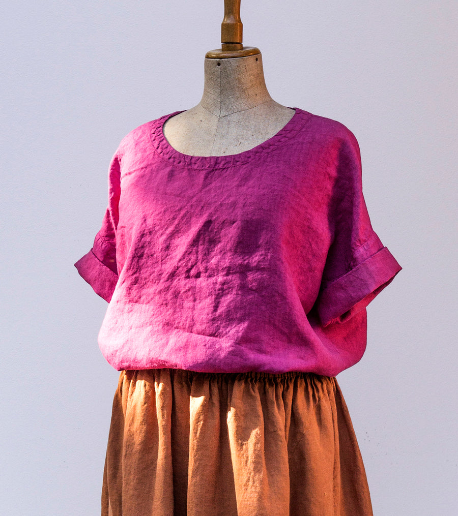 Oversized top with sleeves in Magenta Haze shade